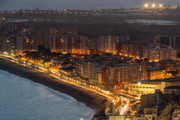 Aerial views of the city of Blanes on the Costa Brava of Gerona Maresme Barcelona European tourist town sunset beach