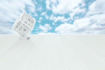 A vertical striped square under a blue sky is lined with art cubes suitable for the background of car advertisements