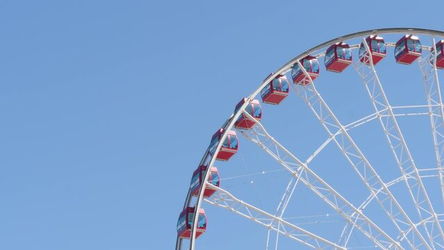 Hong Kong, China - 10 November 2021 : Medium shot of Hong Kong Observation Wheel with blue sky in the background.