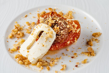 Quince dessert with cream, a delicious Turkish dessert served in a fine dining restaurant