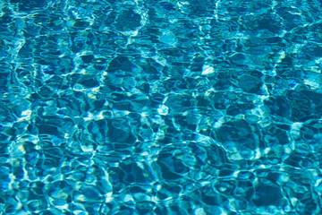 Water in swimming pool, background with high resolution. Wave abstract or rippled water texture.