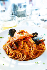 Seafood tagliatelle cream sauce and vegetables