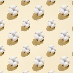Cotton pattern on a light beige background.