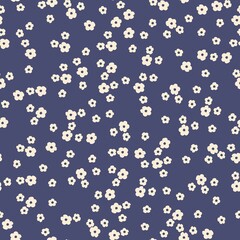 Seamless vintage pattern. Small white flowers . Dark blue background. vector texture. fashionable print for textiles, wallpaper and packaging.