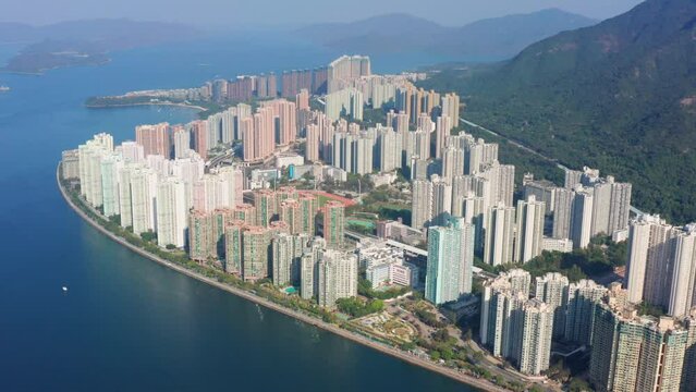 Wonderful skyline of high skyscrapers and downtown district in Ma On Sha Hongkong. Wide drone shot in a claim Autumn day