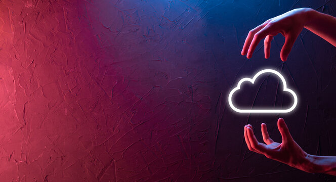 Hand holding icon cloud computing network and icon connection data information in hand. Cloud computing and technology concept.
