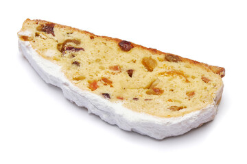 Slices of Traditional Christmas stollen cake with marzipan and dried fruit isolated on white background