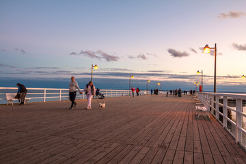 Molo pier on the Baltic Sea in Jastarnia at sunset, Poland.
