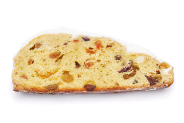 Slices of Traditional Christmas stollen cake with marzipan and dried fruit isolated on white background