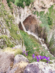 Kyzyl-su Waterfall surrounded by the Caucasus Mountains near Elbrus, Jily-su, Russia