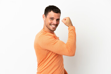 Brazilian man over isolated white background doing strong gesture