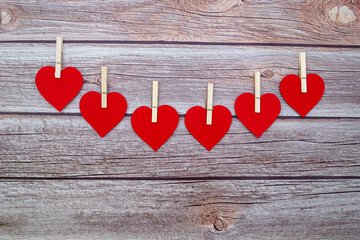 Valentine's day. Red hearts on wooden background with copy space. Place for text. Valentines day. Sweet day. 
