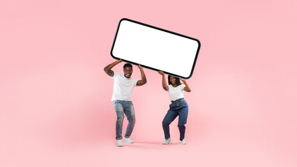 Black couple holding heavy white empty smartphone screen