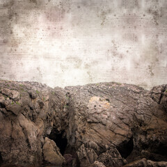 stylish textured old paper square background with landscape of coastal part of Cantabria called Costa Quebrada, the Broken coast
