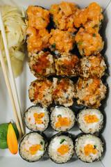 Delivery in boxes of sushi rolls