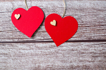 Two red hearts on wooden background, Valentines day, romantic concept. Copy space. Space for text.