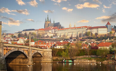 Fototapeta na wymiar Evening sky View of Prague Castle and Charles Bridge in spring season at Czech Republic.