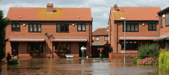 flooded homes and street, flash flooding  