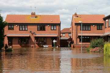 flooded homes and street, flash flooding  