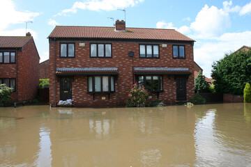 flooded homes and street, flash flooding  