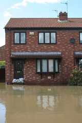 flood disaster zone, flooded houses and streets, flash flooding extreme weather 