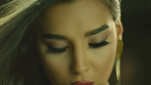 Close-up portrait of nice-looking  multi race beautiful elegant young woman looking at camera. Advertisement of Fashion with Young Woman . Fashion, beauty. Female portraits . Shot on ARRI ALEXA camera
