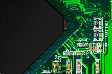 Close up of components and microchips on PC circuit board.