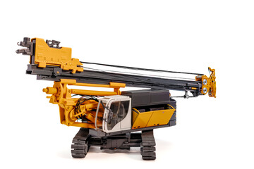 Hydraulic drilling rig isolated on white background. Caterpillar drilling rig for piling. Drilling...