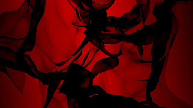 Gently waving sheer black cloth against a red background
