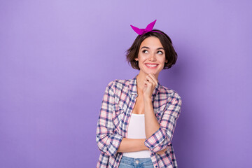 Photo of youth cheerful lady wonder dream look empty space idea isolated over violet color background