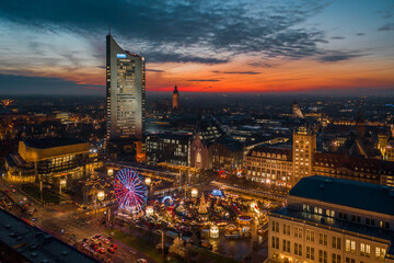 Leipzig Christmas Market - Weihnachtsmarkt - Augustusplatz - Drone Aerial Sunset - Red Sky