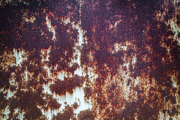 Old grunge rusty metal texture with scratches and crack. Vintage dark rustic metal background.