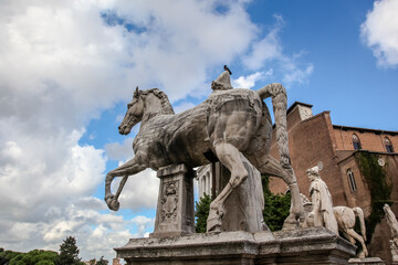 Fototapeta na wymiar Statues of the Dioscuri at the grand staircase on the Capitoline Hill in Rome. Italy