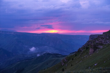 Fototapeta premium Sunset on the Bermamyt plateau in the Karachay-Cherkess Republic, Russia. Elbrus.
