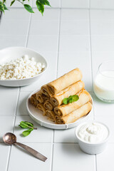 Pancakes with cottage cheese on a white background.