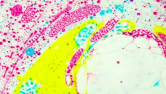 Background of scientific image Cells and blood cells seen from a simulated microscope with yellow, blue, magenta and white ink colors