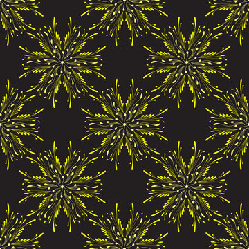Seamless pattern with yellow abstract flowers on a black background for packaging, fabrics, backgrounds and other products.