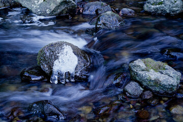 Ice on the river, ice muscles along the river and in the water, winter scenery