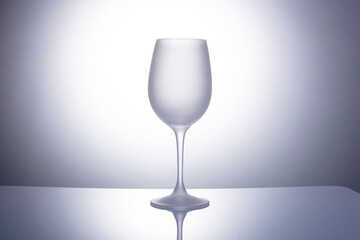 empty wine glass on gray background