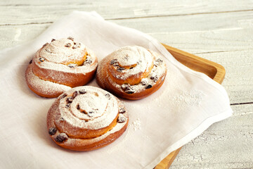 Fresh pastries with raisins for coffee or for a snack with tea