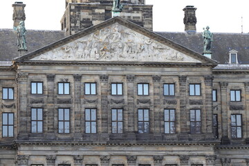 Fototapeta na wymiar Amsterdam Dam Square Royal Palace Facade Detail with Sculpted Details, Netherlands