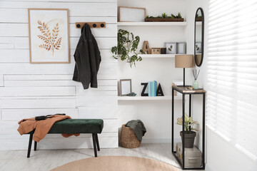 Hallway interior with console table and stylish decor