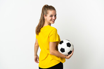 Young caucasian woman isolated on white background with soccer ball