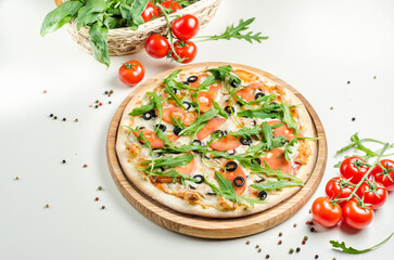 Vegetarian pizza with mushrooms, tomatoes, olives and arugula and mozzarella cheese