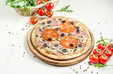 Pizza with ham and mushrooms on concrete table top view