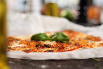 Pizza margherita, classic Neapolitan pizza. Appetizing dish on a plate, culinary photography. Food background.