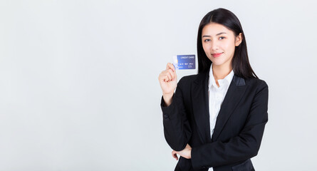 asian business woman wearing office clothing hands show credit card ,credits card and payment concept.