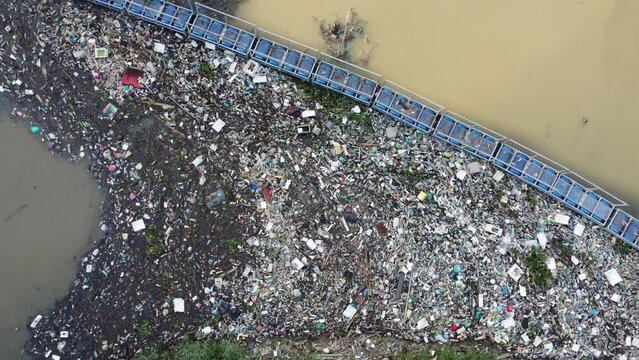 Aerial view look down catchment of rubbish at river
