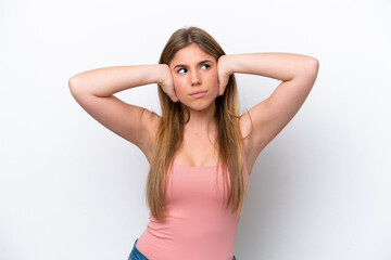 Young caucasian woman isolated on white bakcground frustrated and covering ears