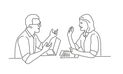 Business people in the workplace having a conversation.